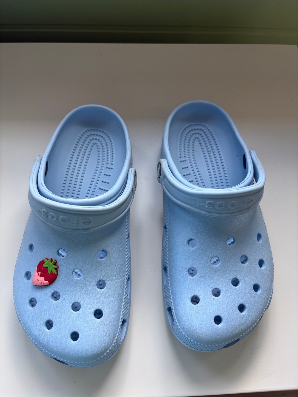 CROCS Light Blue Classic Foam Clogs with Strawberry Charm